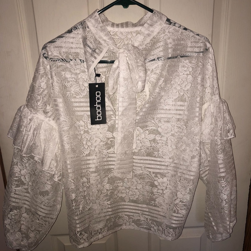 Lace ruffle sleeve top with tie neck